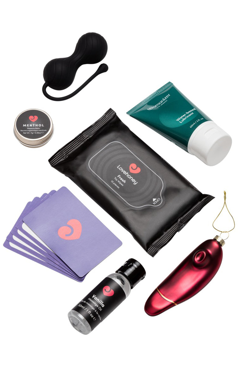 Calendrier de l'Avent Couples – boules de geisha, lubrifiant Womanizer, huile de massage et cartes